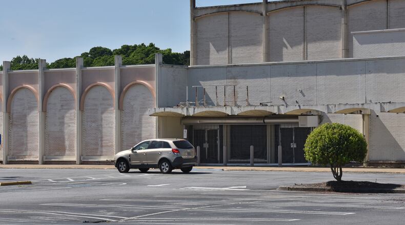 North DeKalb Mall has gained additional revenue as a site for film productions, turning vacant storefronts into fictional sets. HYOSUB SHIN / HSHIN@AJC.COM