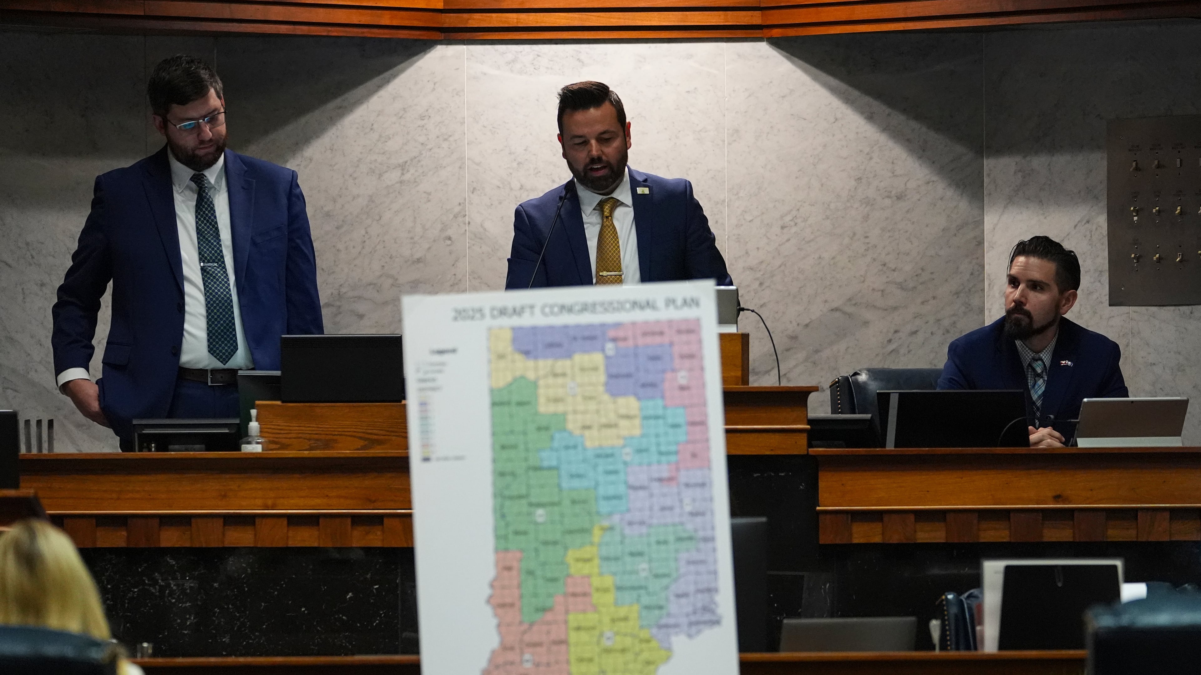 Indiana Lt. Gov. Micah Beckwith announces the results of a vote to redistrict the state's congressional map, Thursday, Dec. 11, 2025, at the Statehouse in Indianapolis. (AP Photo/Michael Conroy)
