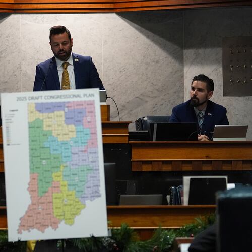 Indiana Lt. Gov. Micah Beckwith announces the results of a vote to redistrict the state's congressional map, Thursday, Dec. 11, 2025, at the Statehouse in Indianapolis. (AP Photo/Michael Conroy)