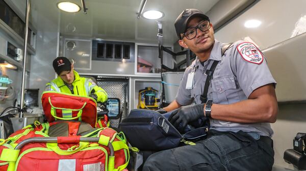 May 21, 2020 Atlanta: Grady EMS Advanced EMT, Ben Jackson (left) and paramedic, Justin Vidican (right). EMS Advanced EMT, Ben Jackson said, "We're going to the same calls,handling some new stuff, but more than anything we've been out, we've been present in the city, we've been showing people we're still out here taking care of them. Nothing's changed, we're still out here." Paramedic, Justin Vidican commented on the pandemic saying, "It's really showed me how much we're needed in this city. The call volume has increased, I really feel the value of my job doing this day after day.I still love it. I still love it, I'll continue to love it throughout the years to come."




 JOHN SPINK/JSPINK@AJC.COM