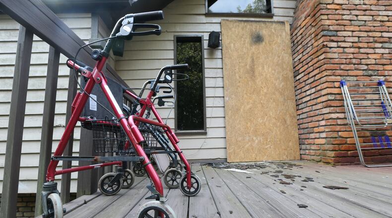 A woman was killed and a man was injured in a fire at a personal care home in Lawrenceville on Monday night. JOHN SPINK/JSPINK@AJC.COM
