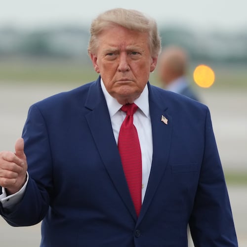 President Donald Trump walks from Marine One to board Air Force One at Cleveland Hopkins International Airport in Cleveland, Tuesday, Aug. 11, 2026. (AP Photo/Mark Schiefelbein)