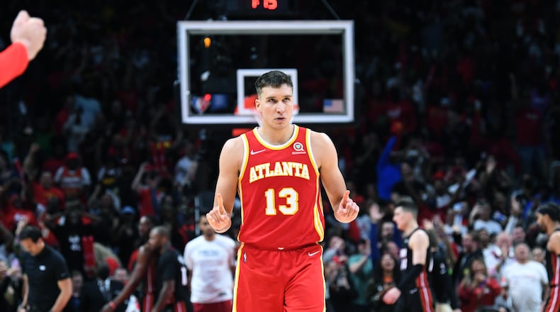 Atlanta Hawks' guard Bogdan Bogdanovic (13) reacts at the end of the fourth quarter in Game 3 of the first round of the NBA playoffs at State Farm Arena on Friday, April 22, 2022. Atlanta Hawks won 111-110 over Miami Heat. (Hyosub Shin / Hyosub.Shin@ajc.com)