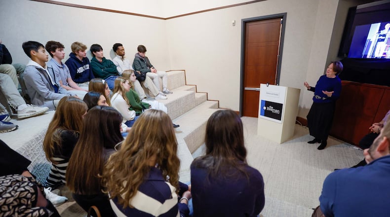 Roberta Lynn Wechsler shared her late father's harrowing survival story from the Holocaust with students at the William Breman Jewish Heritage Museum in Atlanta. “He is my hero,” she said. “We promised him that we would share his story so that the past does not become our future.” (Miguel Martinez / AJC)