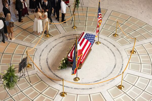Attendees pay their respects during a funeral service for former U.S. Rep. Mia Love, Sunday, April 6, 2025, in Salt Lake City. (AP Photo/Melissa Majchrzak)