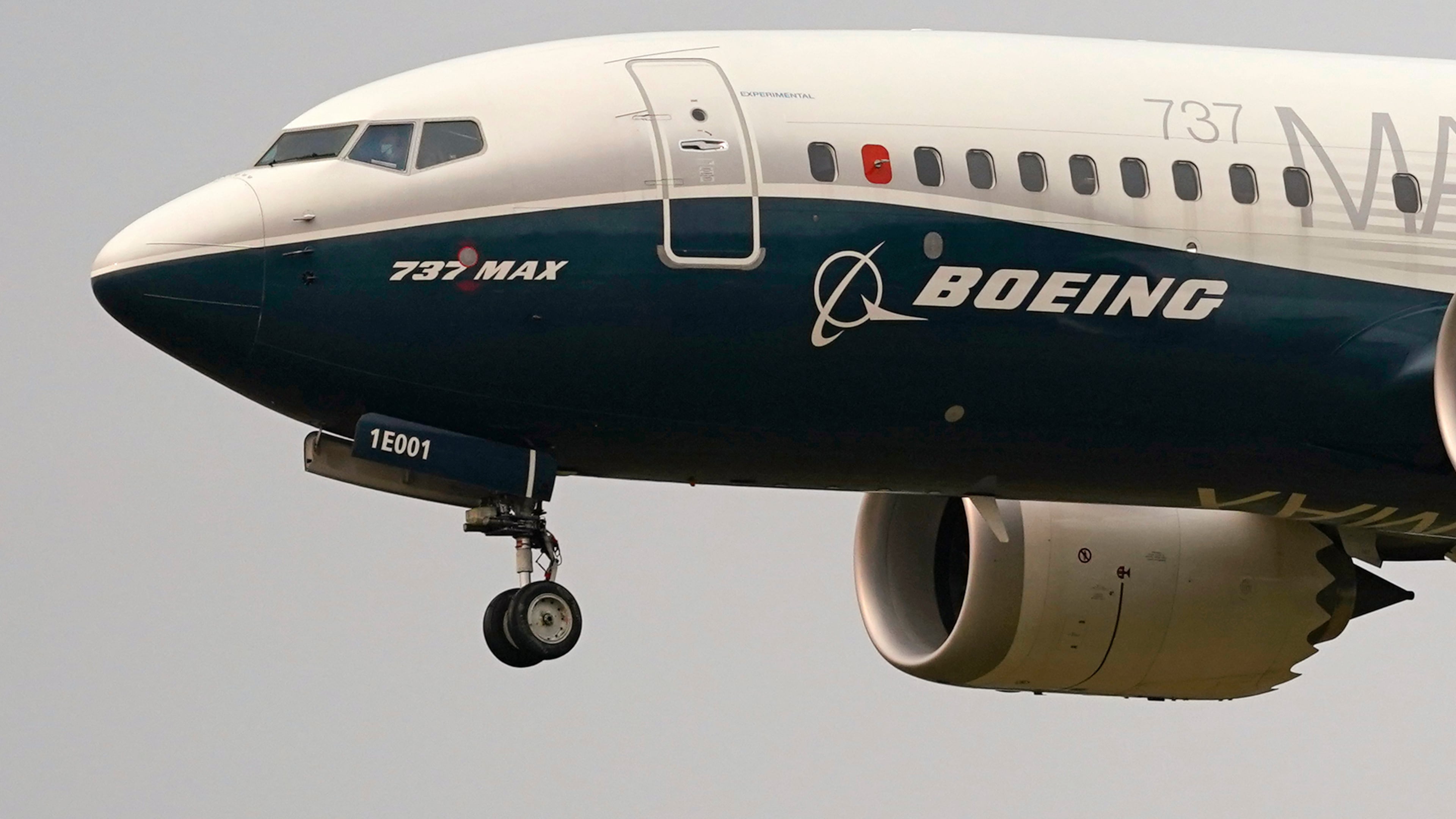FILE - A Boeing 737 Max jet prepares to land at Boeing Field following a test flight in Seattle, Sept. 30, 2020. (AP Photo/Elaine Thompson, File)
