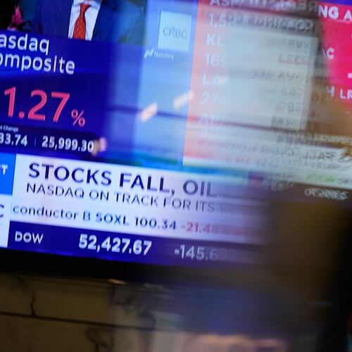 Electronic displays show financial news on the floor at the New York Stock Exchange in New York, Monday, Sept. 14, 2026. (AP Photo/Seth Wenig)
