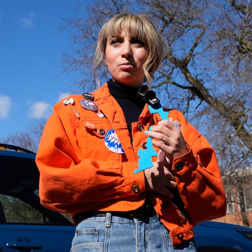 FILE - Democratic candidate for Congress Kat Abughazaleh talks with reporters after voting in the primary election for the upcoming midterms outside the Chicago Park District Loyola field house in Chicago, March 17, 2026. (AP Photo/Nam Y. Huh, File)