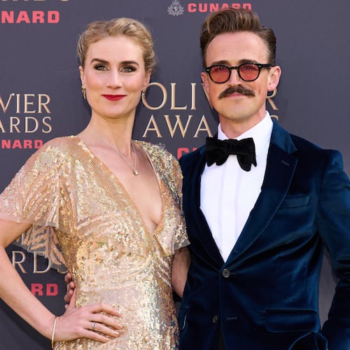 FILE - Jessica Swale, left, and Tom Fletcher appear at the Olivier Awards in London on April 12, 2026. (Photo by Scott A Garfitt/Invision/AP, File)