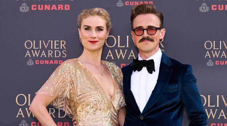 FILE - Jessica Swale, left, and Tom Fletcher appear at the Olivier Awards in London on April 12, 2026. (Photo by Scott A Garfitt/Invision/AP, File)