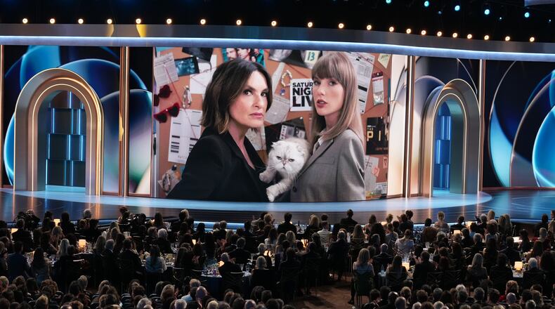Host Mariska Hargitay left, and Taylor Swift in a "Law and Order: SVU" skit during the 78th Emmy Awards on Monday, Sept. 14, 2026, at the Peacock Theater in Los Angeles. (AP Photo/Chris Pizzello)