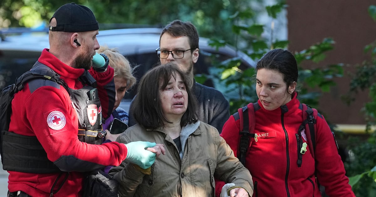 Russian attacks on Ukraine kill at least 14 people as Zelenskyy travels to UK