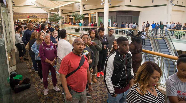 People wait in line inside Gwinnett Place Mall with hopes of receiving a ticket to see former President Barack Obama speak in Atlanta, Wednesday, October 31, 2018. (ALYSSA POINTER/ALYSSA.POINTER@AJC.COM)