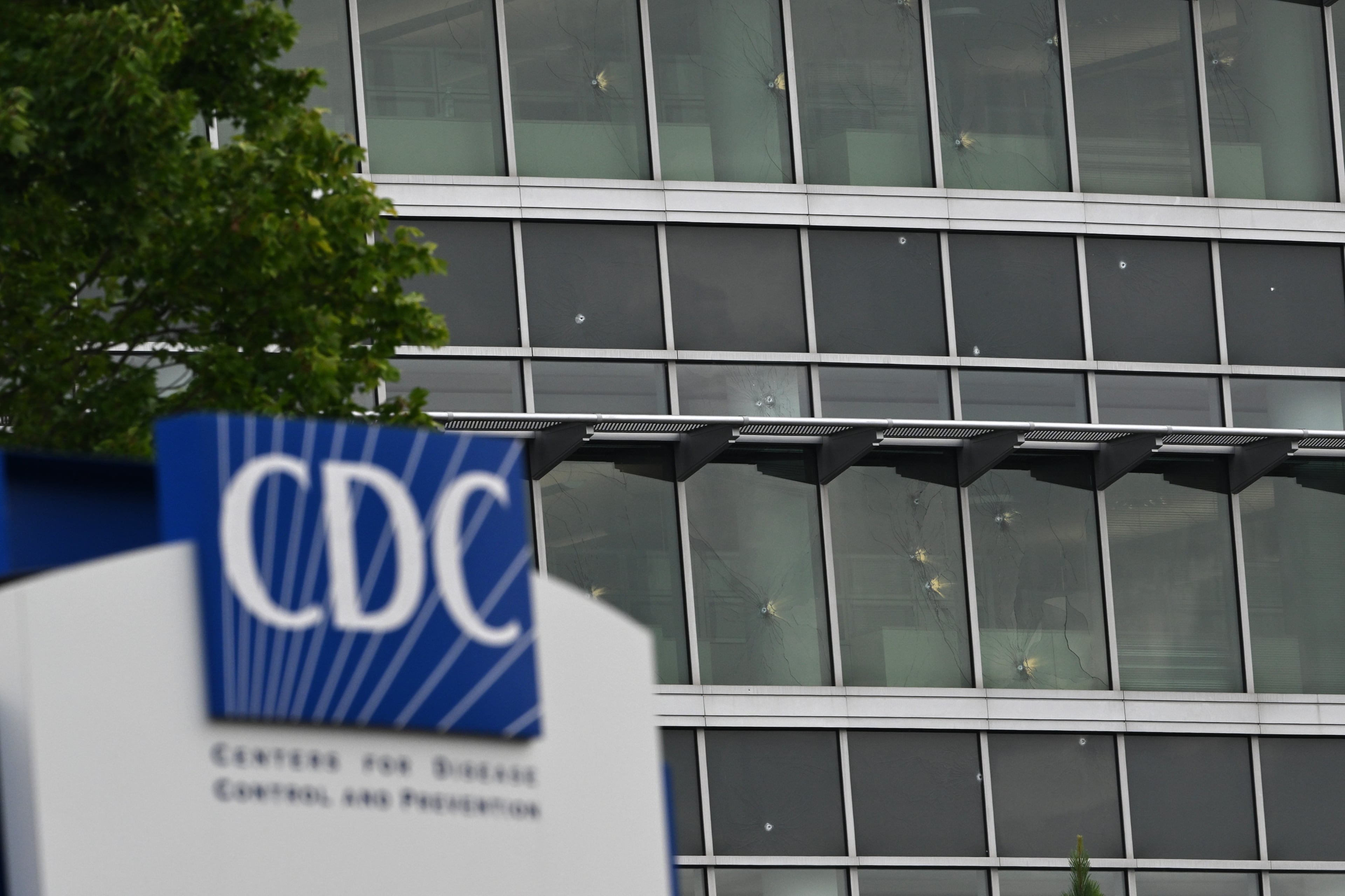 Bullet holes are visible in a CDC building on Saturday, August 9, 2025, after a deadly shooting Friday. (Hyosub Shin/AJC)
