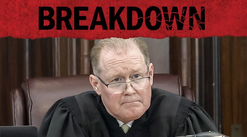 Superior Court Judge Timothy Walmsley listens to Ahmaud Arbery's father give an impact statement during the sentencing for the three men convicted of Arbery's muder. Episode 19 of the AJC's "Breakdown" podcast examines the sentences received by Travis and Greg McMichael, and their neighbor William "Roddie" Bryan. (Stephen B. Morton / AP)