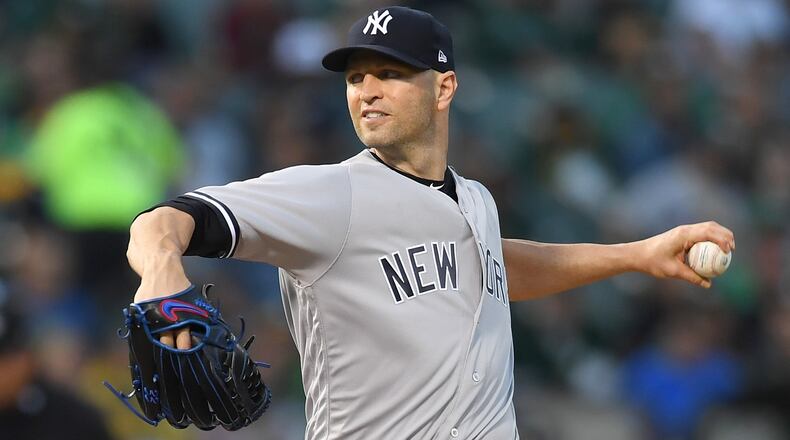 J.A. Happ of the New York Yankees pitches against the Oakland Athletics in the bottom of the first inning at Oakland Alameda Coliseum on September 4, 2018 in Oakland, California.  (Photo by Thearon W. Henderson/Getty Images)