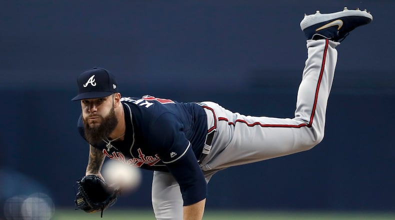 Atlanta Braves starting pitcher Dallas Keuchel works against a San Diego Padres batter during the first inning of a baseball game Friday, July 12, 2019, in San Diego. (AP Photo/Gregory Bull)