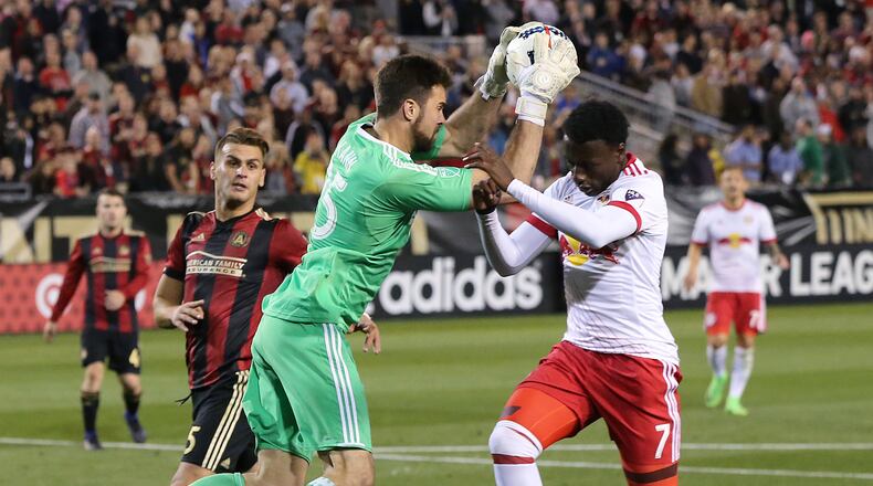 March 5, 2017, Atlanta: Atlanta United RC N.Y. goalkeeper Alec Kann blocks a shot by Red Bulls Derrick Etienne Jr. during the second half in the first game in franchise history on Sunday, March 5, 2017, in Atlanta. Curtis Compton/ccompton@ajc.com