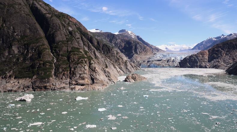 This photo provided by the U.S. Geological Survey looks up Tracy Arm fjord to the terminus of the South Sawyer Glacier about 80 miles southeast of Juneau, Alaska, on Aug. 13, 2025, days after a landslide in the area. (John Lyons/U.S. Geological Survey via AP)