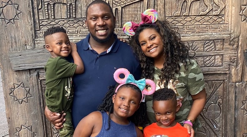 Former Georgia Tech running back Rashaun Grant and his family: His wife, Jessica; daughter Skyla; and sons Jadari (red shirt) and Jaiden (green shirt). (Photo courtesy Rashaun Grant)