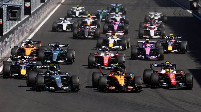 McLaren driver Lando Norris of Britain, center, leads the field after the start of the Spanish Formula One Grand Prix race in Madrid, Sunday, Sept. 13, 2026. (AP Photo/Manu Fernandez)