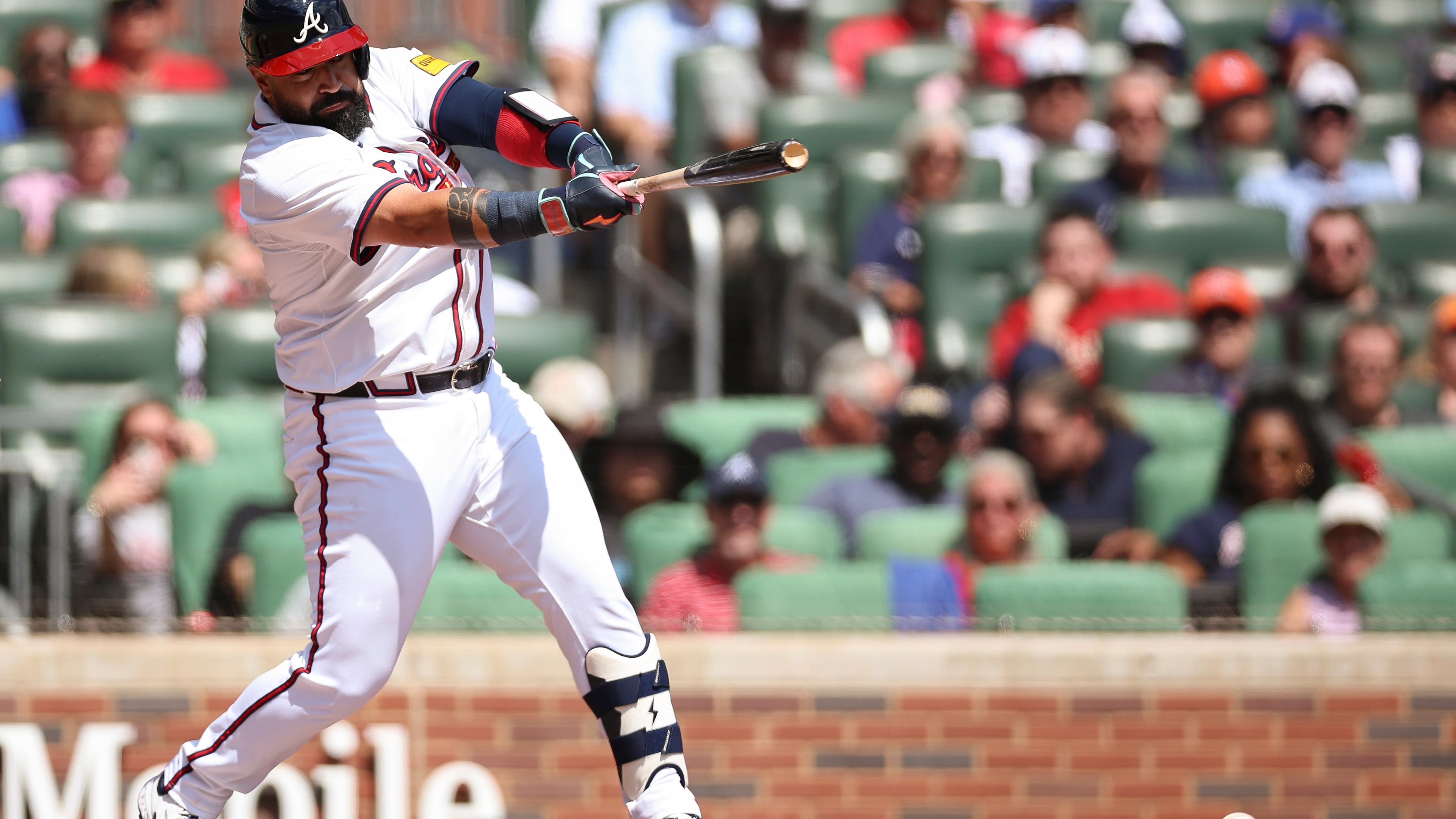 Atlanta Braves' Sandy León hits into a fielders choice that scores a run on an error in the second inning of a baseball game against the Houston Astros, Sunday, Sept. 14, 2025, in Atlanta. (AP Photo/Colin Hubbard)