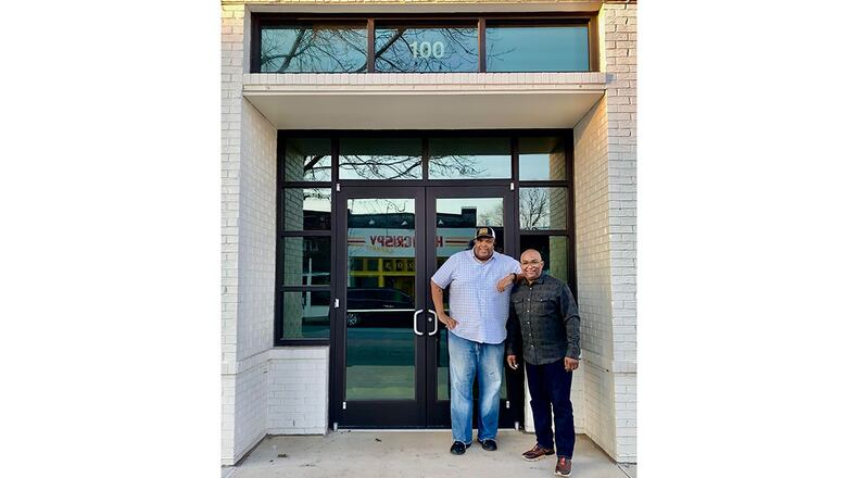 Duane Nutter (left) and Reggie Washington in front of their forthcoming Summerhill restaurant Southern National.