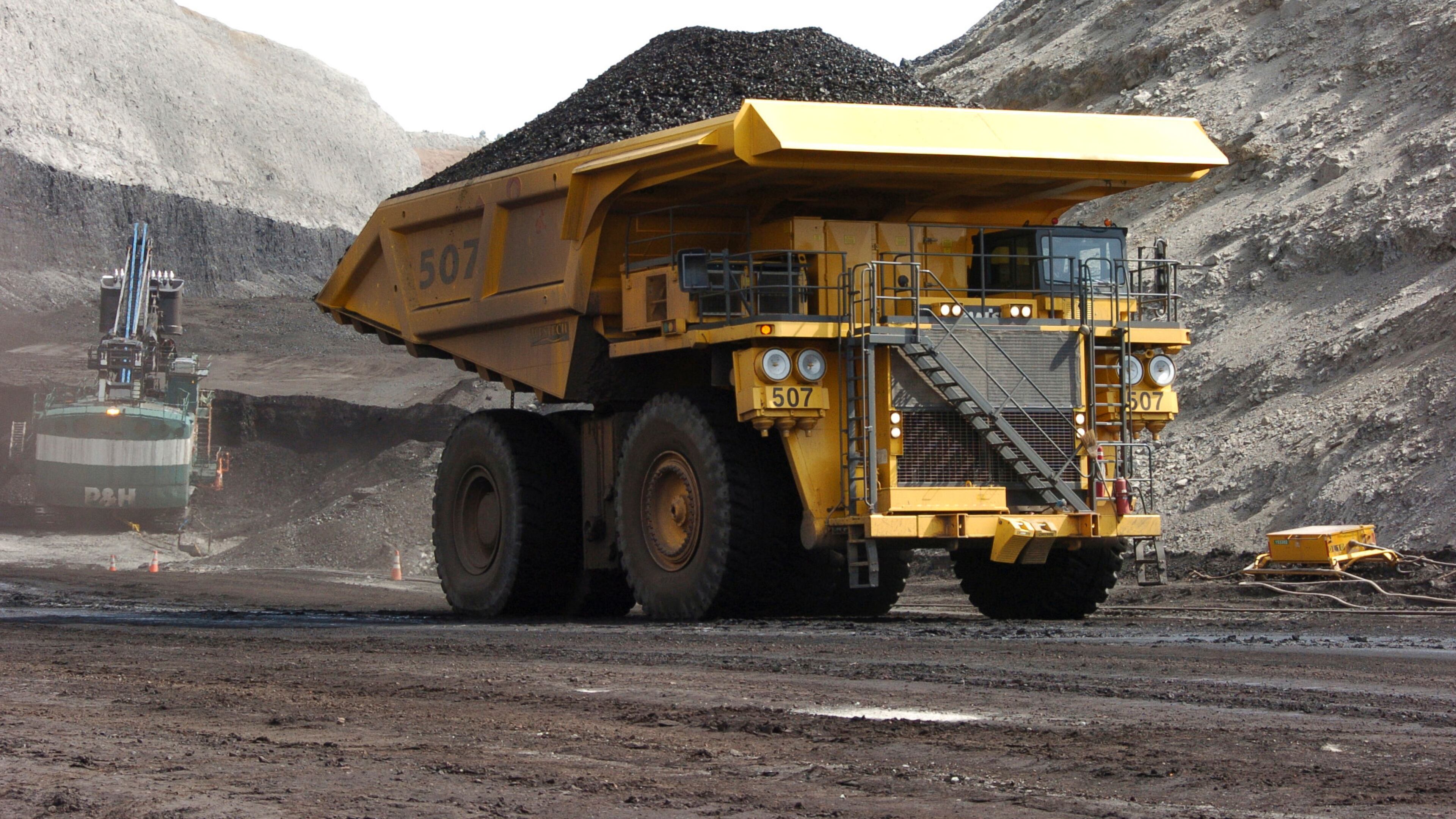 FILE - In this April 4, 2013, file photo, a mining dumper truck hauls coal at Cloud Peak Energy's Spring Creek strip mine near Decker, Mont. AP Photo/Matthew Brown, File)