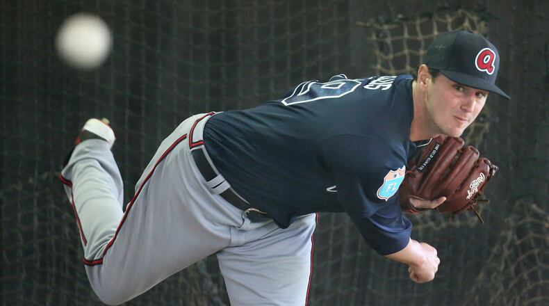 022416 LAKE BUENA VISTA: Braves pitcher Chris Ellis delivers a pitch in the batting cages at Champion Stadium on Wednesday, Feb 24, 2016, at the ESPN Wide World of Sports, Lake Buena Vista, FL. Curtis Compton / ccompton@ajc.com