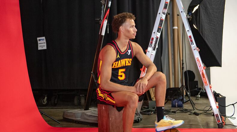Hawks player Dyson Daniels, #5, poses for photos during media day. Hawks media day takes place on Monday, Sept 30, 2024 where media outlets including the Associated Press, Getty, NBA and many others gather to take photos, conduct interviews and gather footage.   (Jenni Girtman for The Atlanta Journal-Constitution)