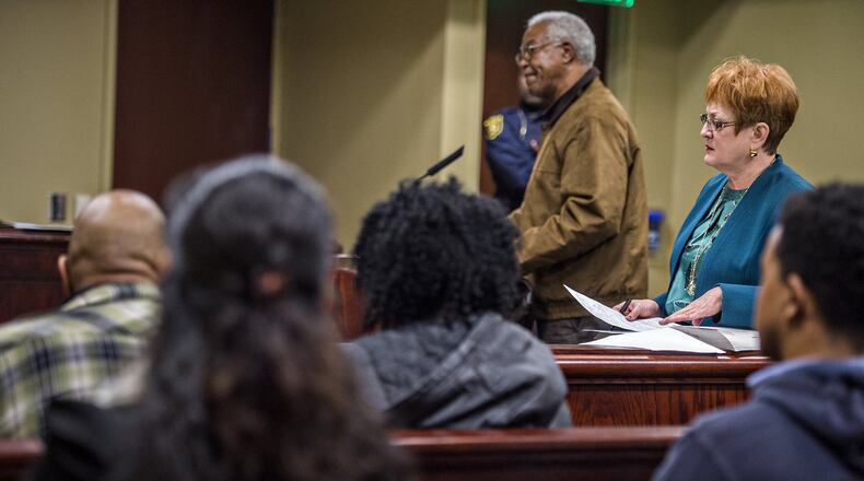 Solicitor Janet Newburg, right, and Clarence Youmans speak in court at DeKalb County State Court’s Traffic Division in Decatur on Wednesday. Money collected from traffic tickets in DeKalb has declined after abolishing Recorders Court. JONATHAN PHILLIPS / SPECIAL