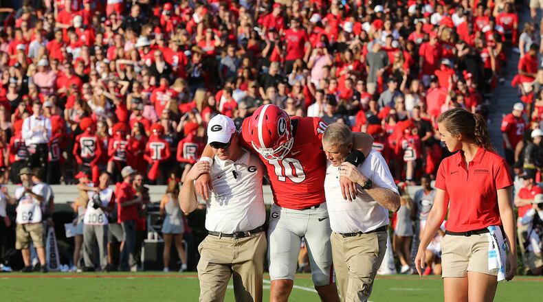 September 2, 2017 Athens: Georgia fans stand in silence as quarterback Jacob Eason leaves the game with an injury during the first quarter against Appalachian State in a NCAA college football game on Saturday, September 2, 2017, in Athens. Curtis Compton/ccompton@ajc.com