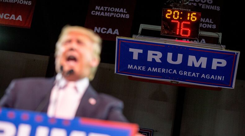 A score board reads "2012" and "76" for the number of delegates the state of Georgia has as Republican presidential candidate Donald Trump speaks at a rally at Valdosta State University in Valdosta, Ga., Monday, Feb. 29, 2016. (AP Photo/Andrew Harnik)