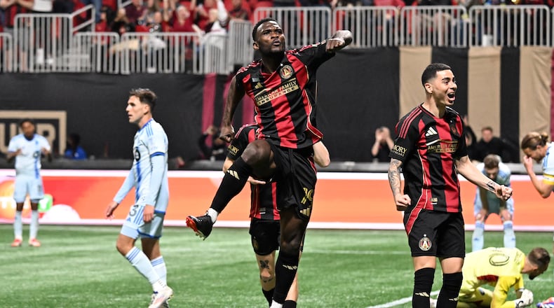 Atlanta United forward Emmanuel Latte Lath (19) celebrates after scoring during the second half of Atlanta United’s MLS season opener at Mercedes-Benz Stadium, Saturday, February 22, 2025, in Atlanta. Atlanta United won 3-2 over CF Montreal. (Hyosub Shin / AJC)
