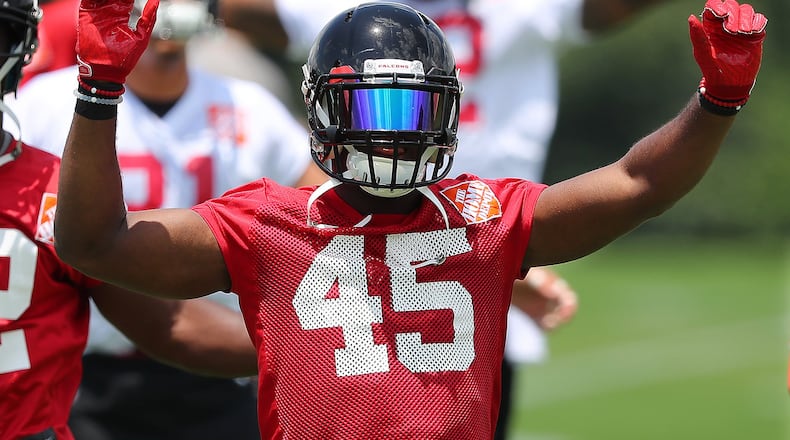 Atlanta Falcons linebacker Deion Jones gets loose running a drill during the first day of mini-camp on Tuesday, June 13, 2017, in Flowery Branch. Curtis Compton/ccompton@ajc.com