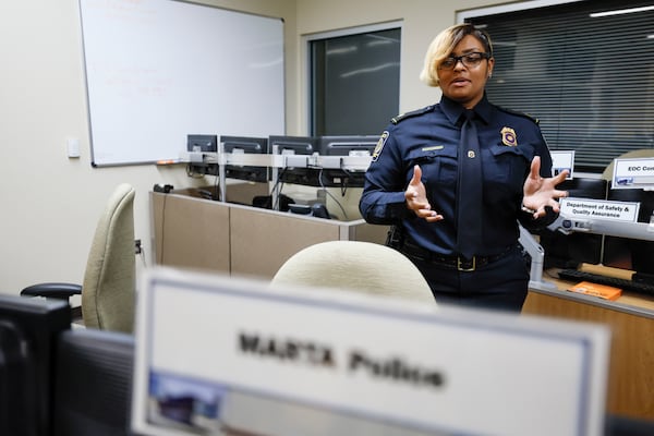 Police Maj. Chablis Salter with MARTA explains how the Emergency Communication Center operates on Thursday, May 1, 2025. The center will be activated during next year's World Cup games to coordinate MARTA's response. (Miguel Martinez/AJC)