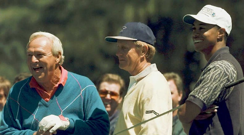 Before Tiger Woods turned pro in 1996, he hung out with Masters champions Arnold Palmer (left) and Jack Nicklaus.