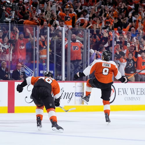 Philadelphia Flyers' Cam York (8) celebrates after scoring the game-winning goal during overtime in Game 6 against the Pittsburgh Penguins in the first round of the NHL hockey Stanley Cup playoffs series Wednesday, April 29, 2026, in Philadelphia. (AP Photo/Matt Slocum)