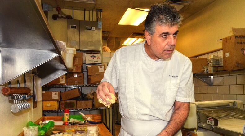 Chef Alon Balshan mixes dough for his Chocolate Babka, a special treat for Hanukkah or anytime, at the Dunwoody location of his beloved Alon’s Bakery. PHOTO CONTRIBUTED BY CHRIS HUNT; FOOD STYLING BY ALON BALSHAN