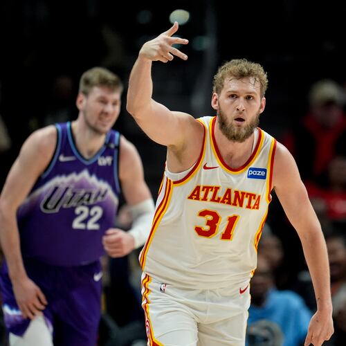 Atlanta Hawks center Jock Landale (31) celebrates his three-poing shot against the Utah Jazz during the first half of an NBA basketball game, Thursday, Feb. 5, 2026, in Atlanta. (AP Photo/Mike Stewart)