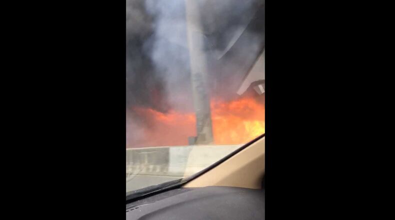 This was Carmen Dixon's view of the I-85 bridge fire from her car.