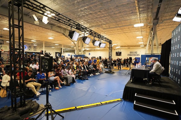 Dallas Mavericks' Cooper Flagg, the No. 1 overall pick in the NBA draft, at podium with head coach Jason Kidd, right, responds to questions during an NBA basketball press conference at the team's practice facility, Friday, June 27, 2025, in Dallas. (AP Photo/Tony Gutierrez)