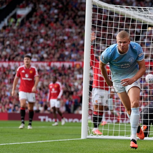 Manchester City's Erling Haaland celebrates after scoring his sides first goal during the English Premier League soccer match against Manchester United in Manchester, England, Sunday Sept. 13, 2026. (Peter Byrne/PA via AP)