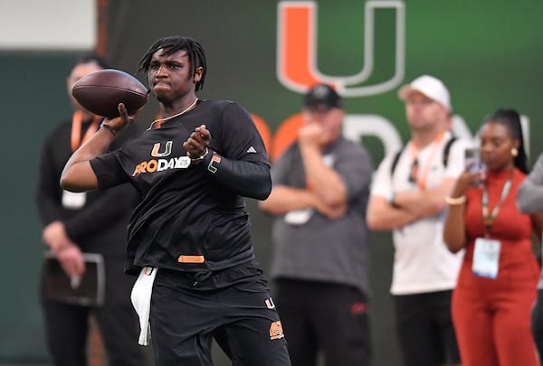 Miami quarterback Cam Ward throws during the school's NFL football pro day Monday, March 24, 2025. (AP Photo/Michael Laughlin)