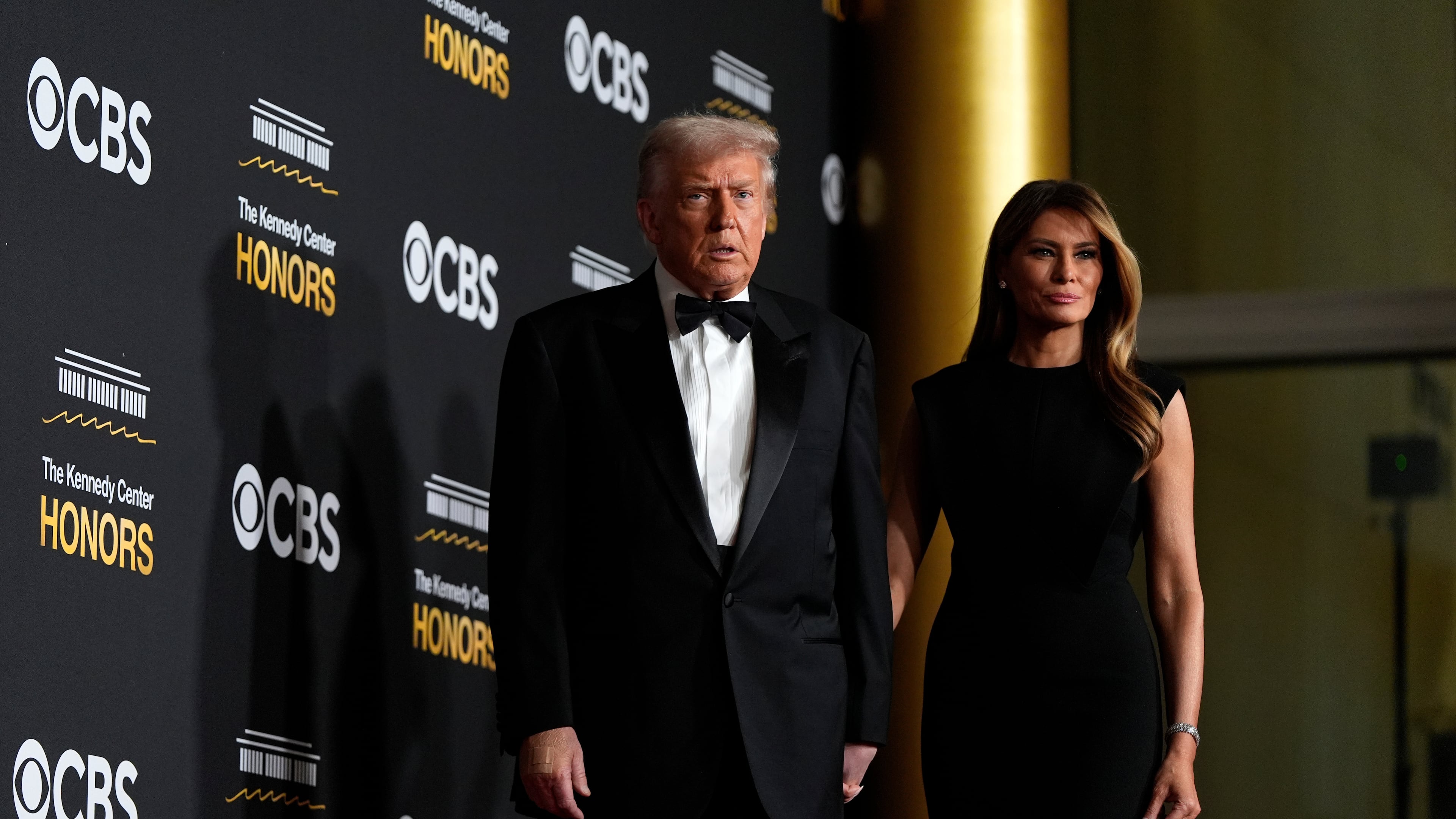 President Donald Trump and first lady Melania Trump, walk the red carpet before the 48th Kennedy Center Honors, Sunday, Dec. 7, 2025, at the John F. Kennedy Center for the Performing Arts in Washington. (AP Photo/Julia Demaree Nikhinson)