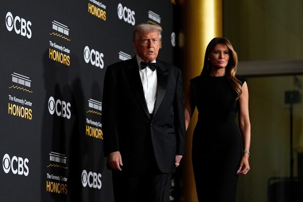 President Donald Trump and first lady Melania Trump walked the red carpet before the Kennedy Center Honors event on Sunday in Washington. (Julia Demaree Nikhinson/AP)