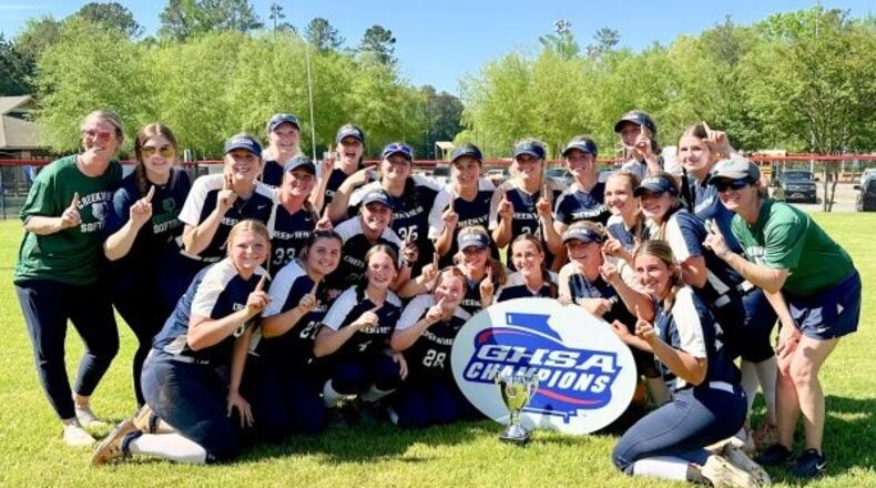 Creekview players and coaches celebrate their 14-3 victory over Jefferson in the championship game of the GHSA slow-pitch softball tournament on April 19, 2024, at Twin Creeks Softball Complex in Woodstock.