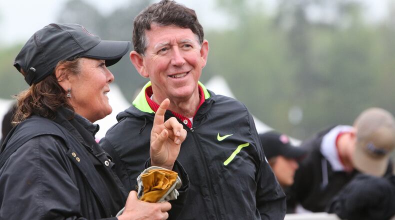 Athletic Director Greg McGarity talks with Georgia equestrian coach Meghan Boenig during a recent event. (Photo by Emily Selby)