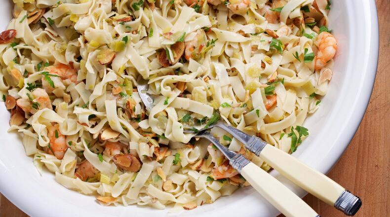 Fettuccine with leeks, shrimp and toasted almonds is a light summer meal that doesn’t require turning on your oven. Contributed by Deb Lindsey