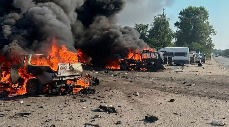 In this photo provided by the Ukrainian Emergency Service, fire is seen on the site of a Russian air attack in Pechenihy, Kharkiv region, Ukraine, Tuesday, Aug. 18, 2026. (Ukrainian Emergency Service via AP)